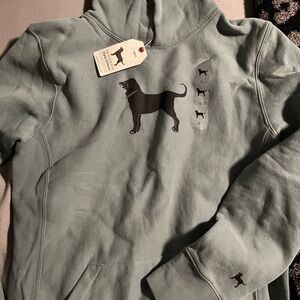 The black dog hoodie in kids size large.